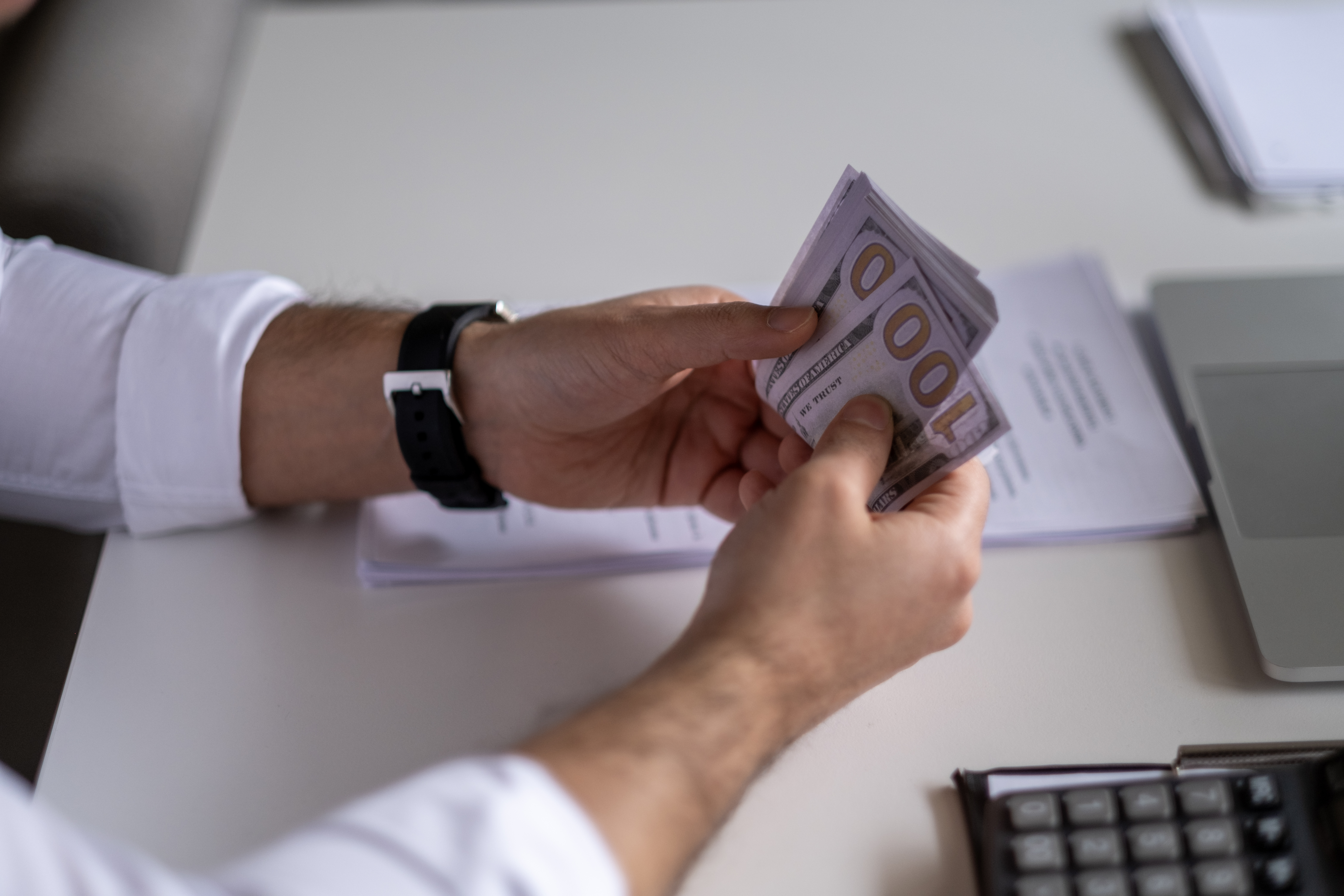 Business man Accounting Calculating Cost Economic budget investment and saving concept